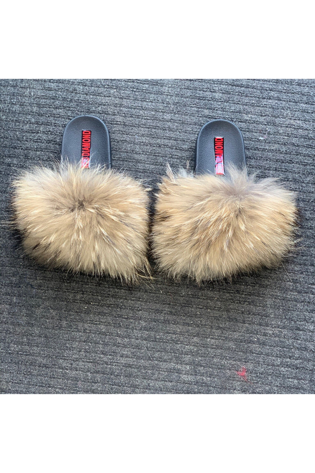 Nude with black ends faux fur slides
